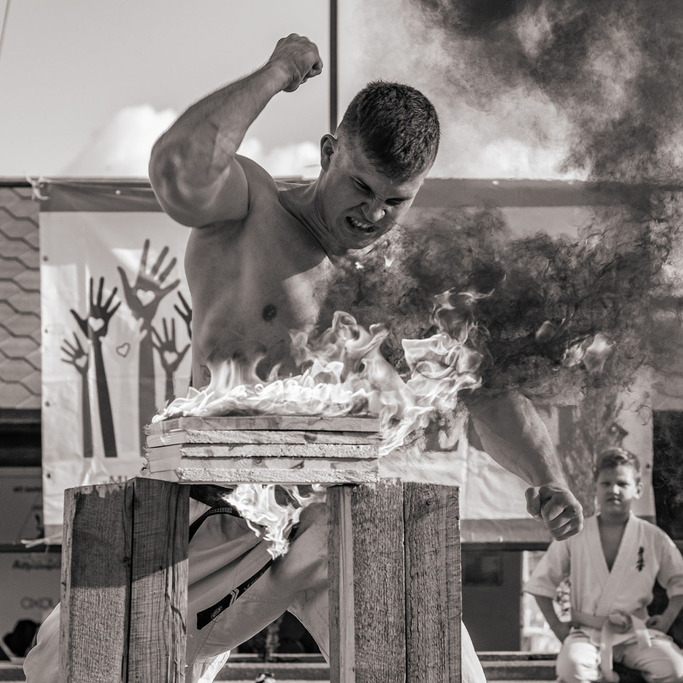 Burning Wood With Weightlifter